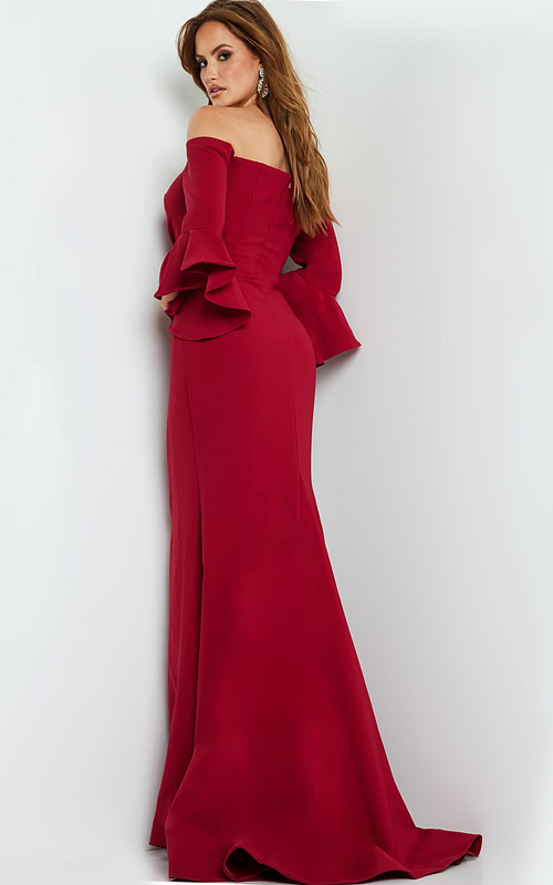 Back view of model wearing Jovani 07065 cranberry dress with off-the-shoulder design and flared sleeves.
