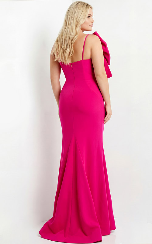 Sleek fitted gown with slim straps and a soft flare hem.