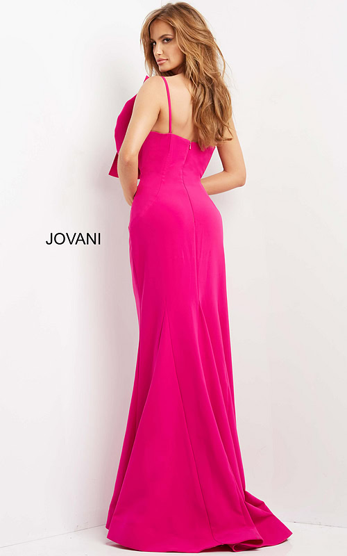 Model wearing Jovani 07306, fuchsia dress, back view with low cut and straps.