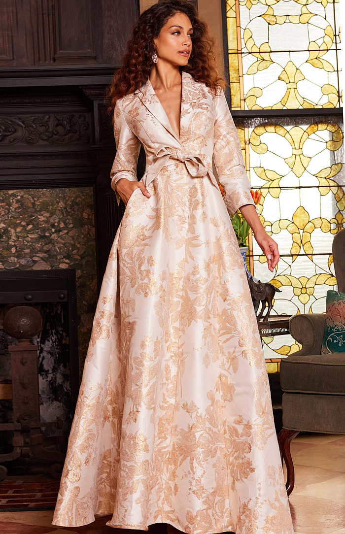 Model showcasing Jovani 23178 gold floral dress with pockets