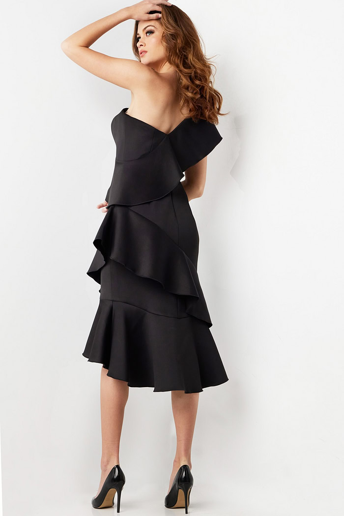 Back view of model in Jovani 25971 black dress highlighting one-shoulder design.