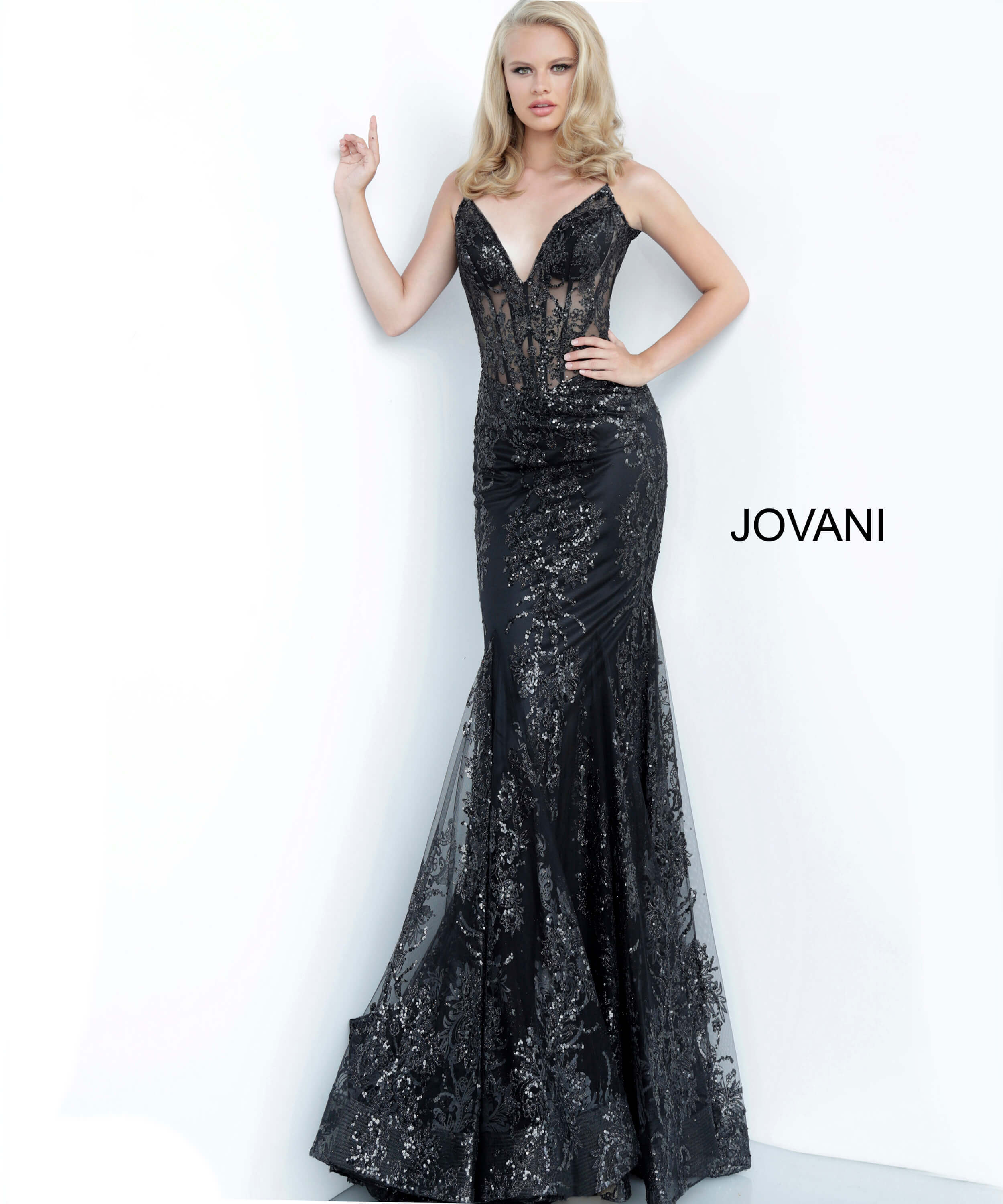 Model wearing Jovani 3675 black dress with detailed sequin embellishments.