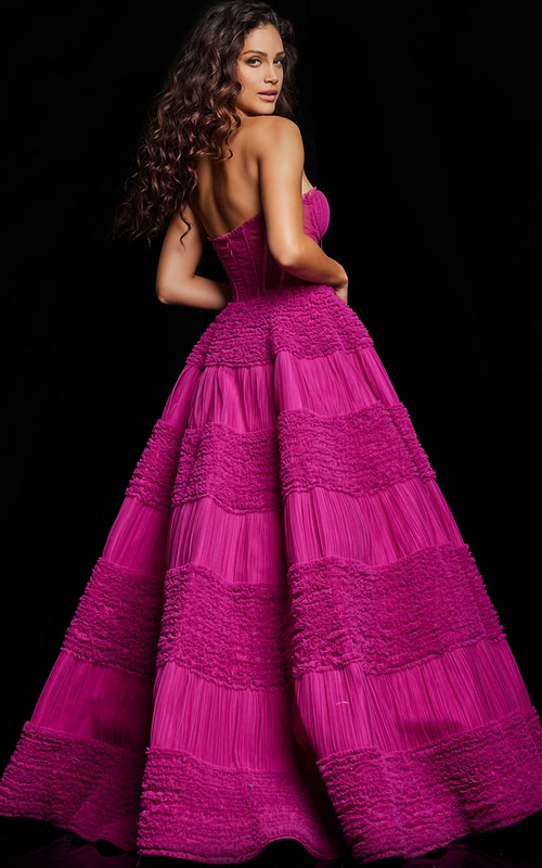 Model wearing Jovani 37157, full-length gown with sweetheart neckline in pink, back view.