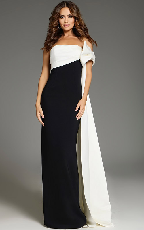 Model wearing Jovani 38864 floor-length black and white gown with off-the-shoulder neckline