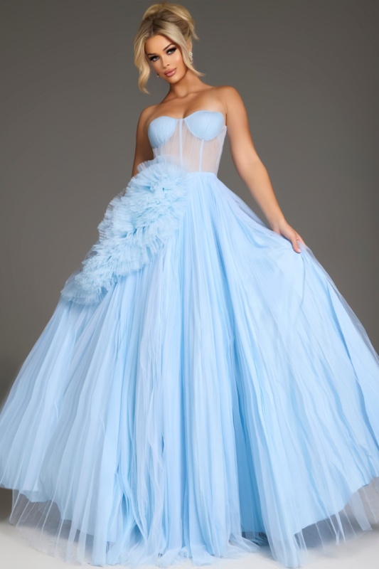 Model wearing Jovani 38946 black gown, front view highlighting detailed bodice and flowy skirt.