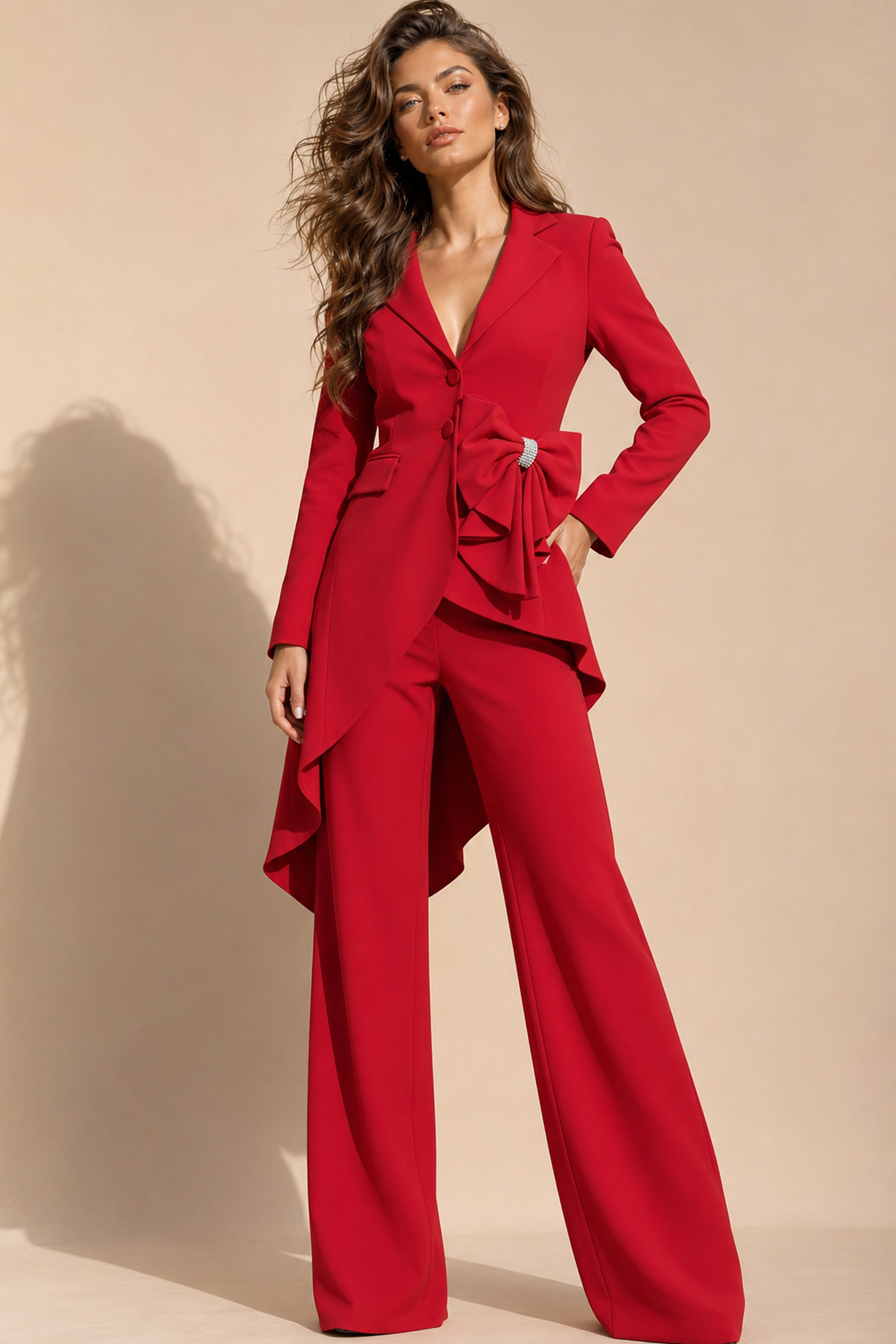 red blazer style floor-length dress with deep V-neck, asymmetric ruffled bow, and high-low hem