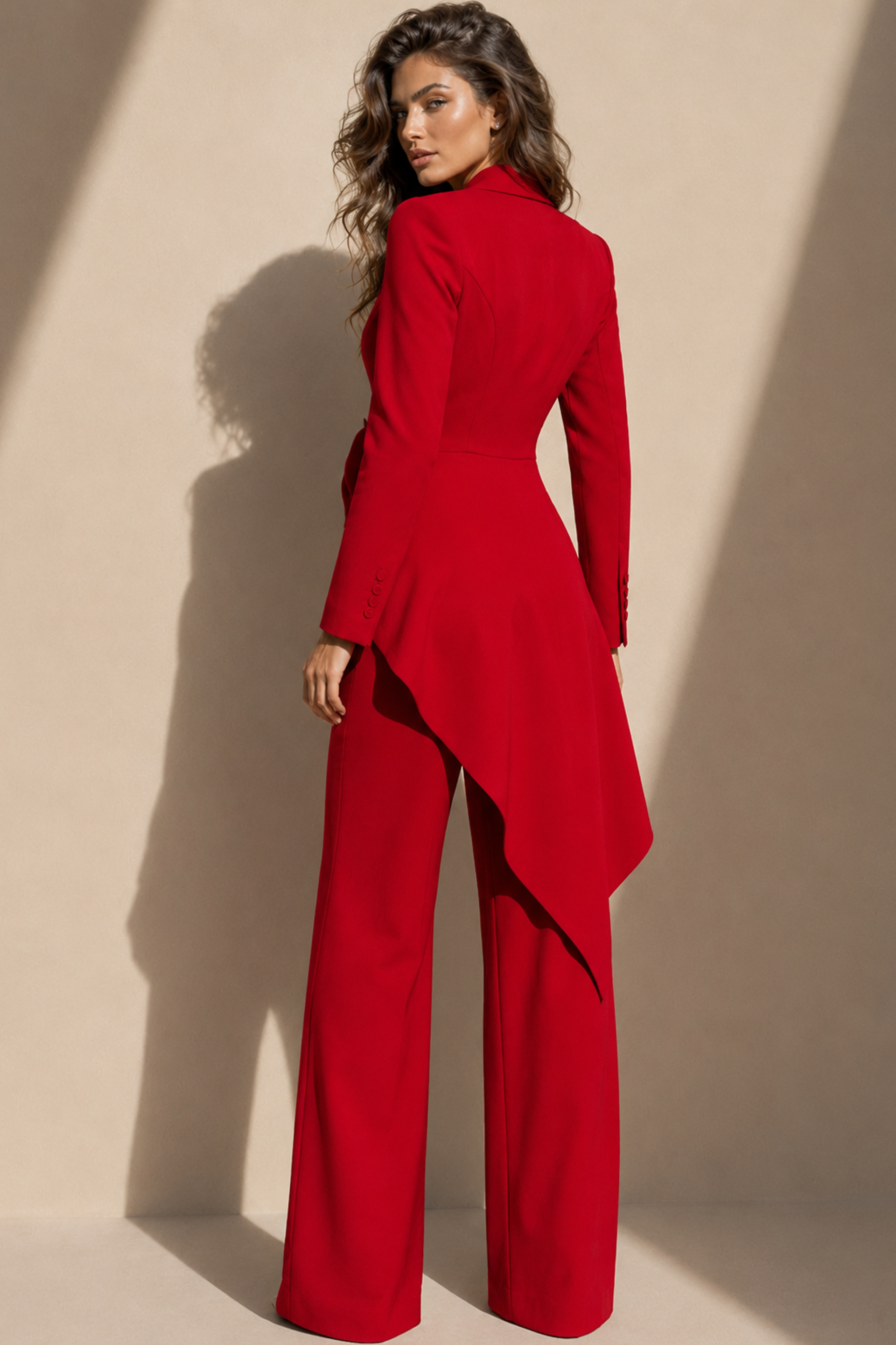 alternate view of red blazer style floor-length dress with deep V-neck, asymmetric ruffled bow, and high-low hem