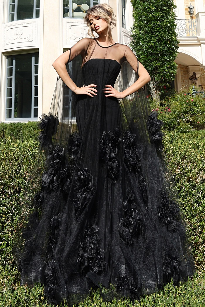 Sheer tulle gown with strapless bodice and floral appliqués