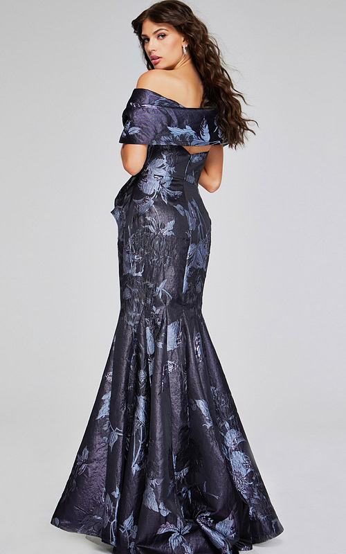 Back view of model in Jovani 40309 mermaid gray gown, highlighting the elegant train and floral motifs.
