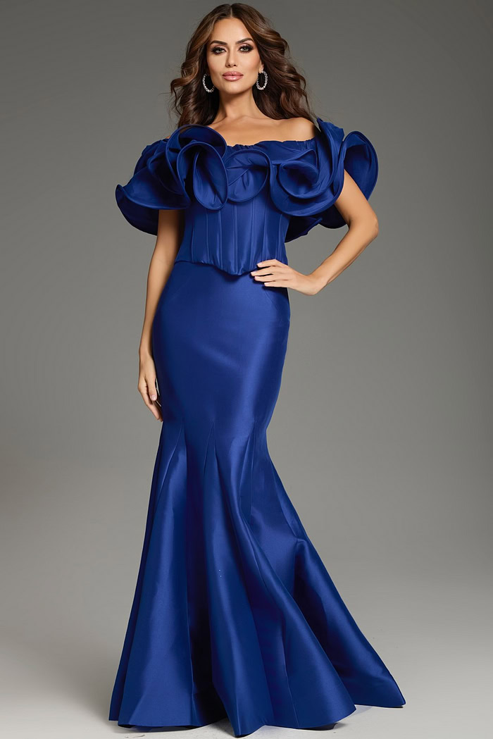 Model wearing Jovani 40324 purple mermaid gown with ruffle details, front view