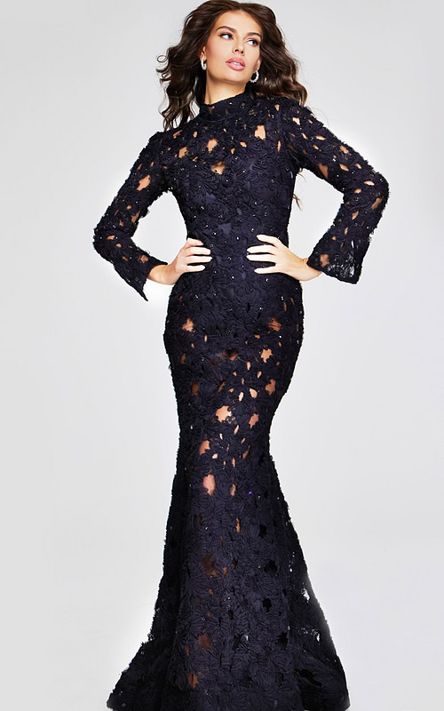 Model wearing Jovani 40743 elegant black lace gown with high neckline and long sleeves, front view.