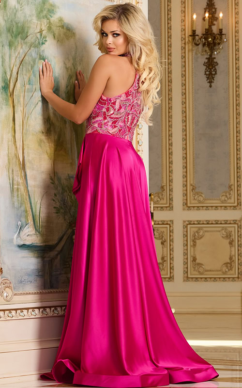 Model wearing Jovani 41186 fuchsia gown with embellished bodice, back view