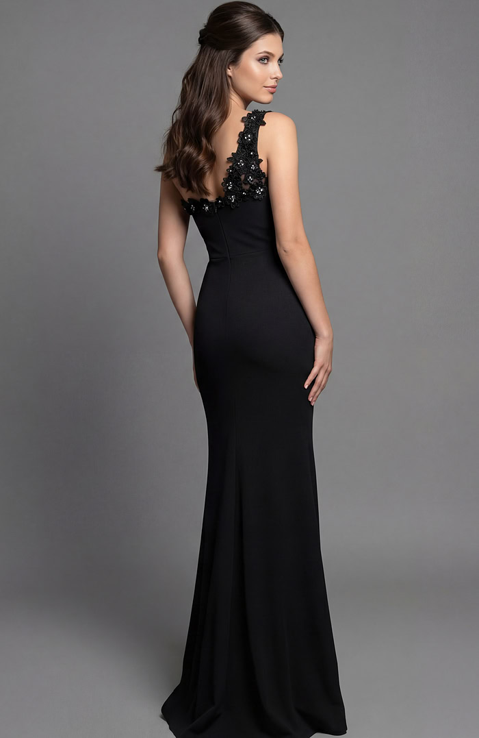 Back view of a fitted gown with floral appliqué detail and clean open back line