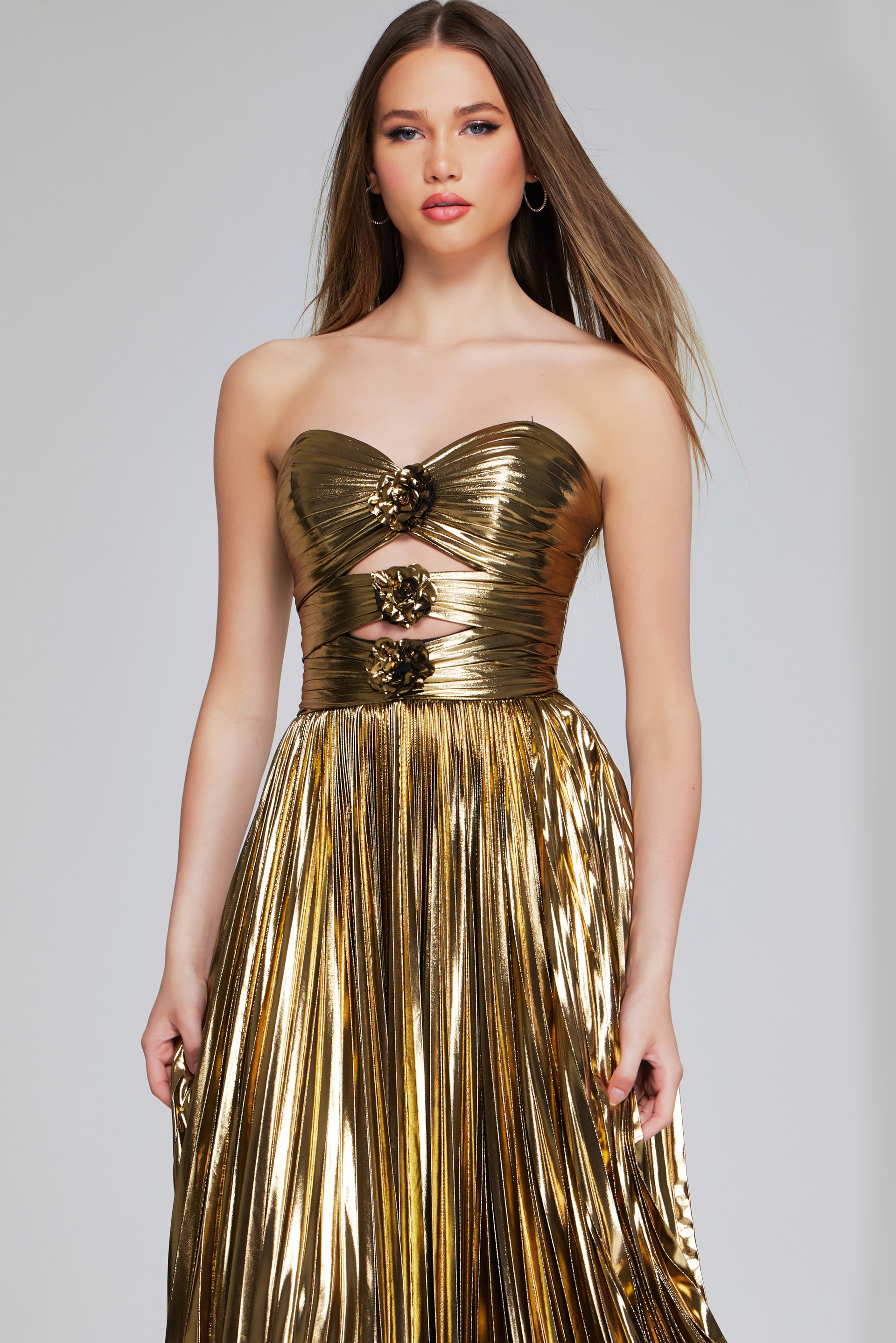 Model in Jovani 42335 gold gown with sweetheart neckline, detailed front view.