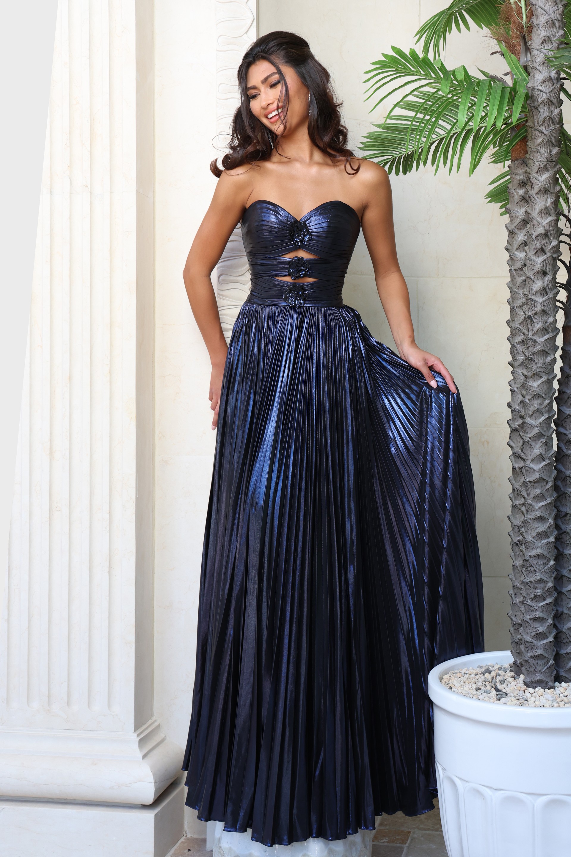 glamorous gold strapless gown with floral accents and cutout detail