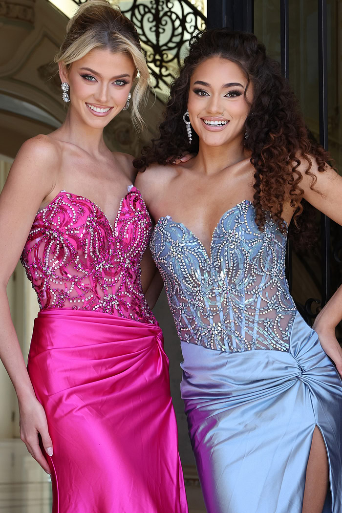 beaded corset dress with high slit - two girls front, blonde updo dark curly hair smiling