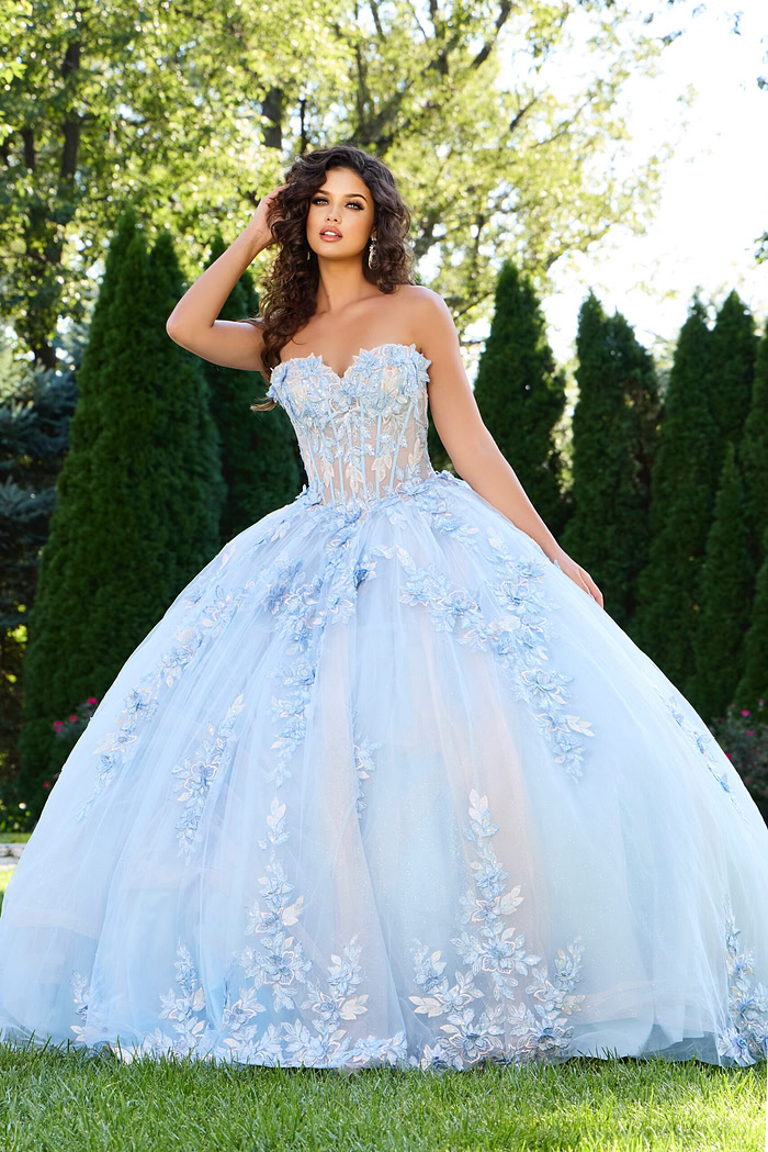 Model posing in Jovani 43433 blue ball gown, front view capturing enchanting details.