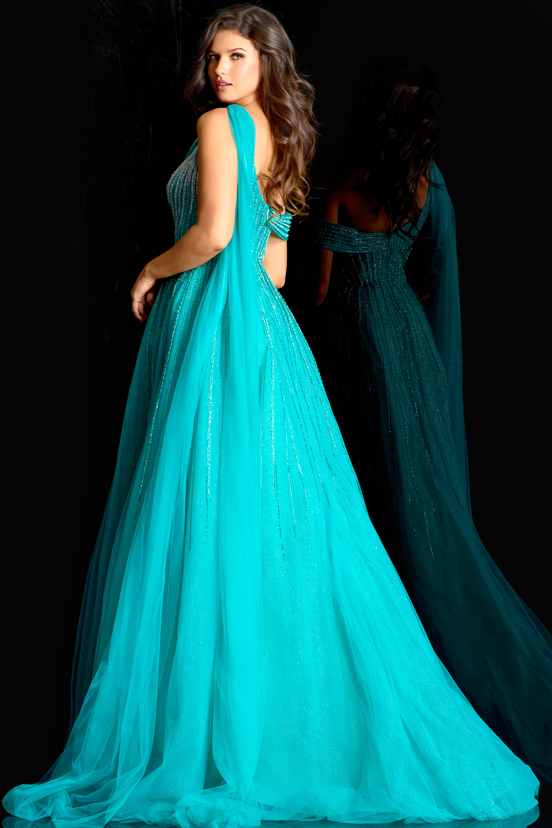 One shoulder tulle gown with shimmering bead lines and flowing skirt