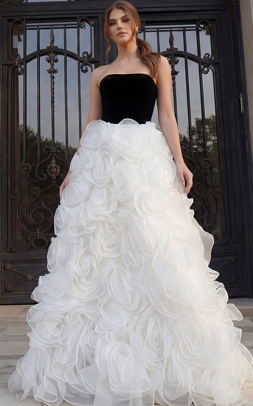 Strapless gown with black fitted bodice and voluminous white rosette skirt