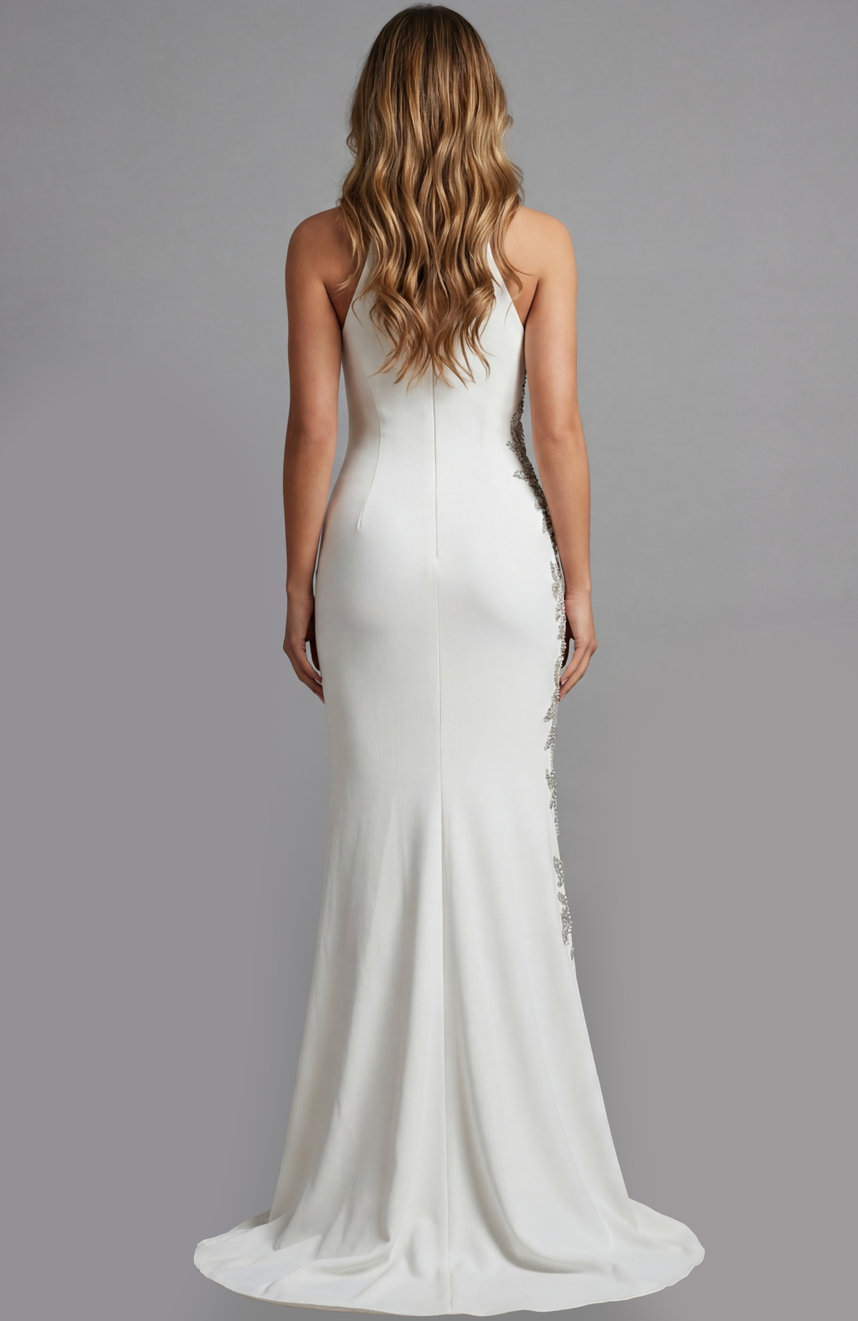 Floor length gown with clean silhouette and flowing hemline