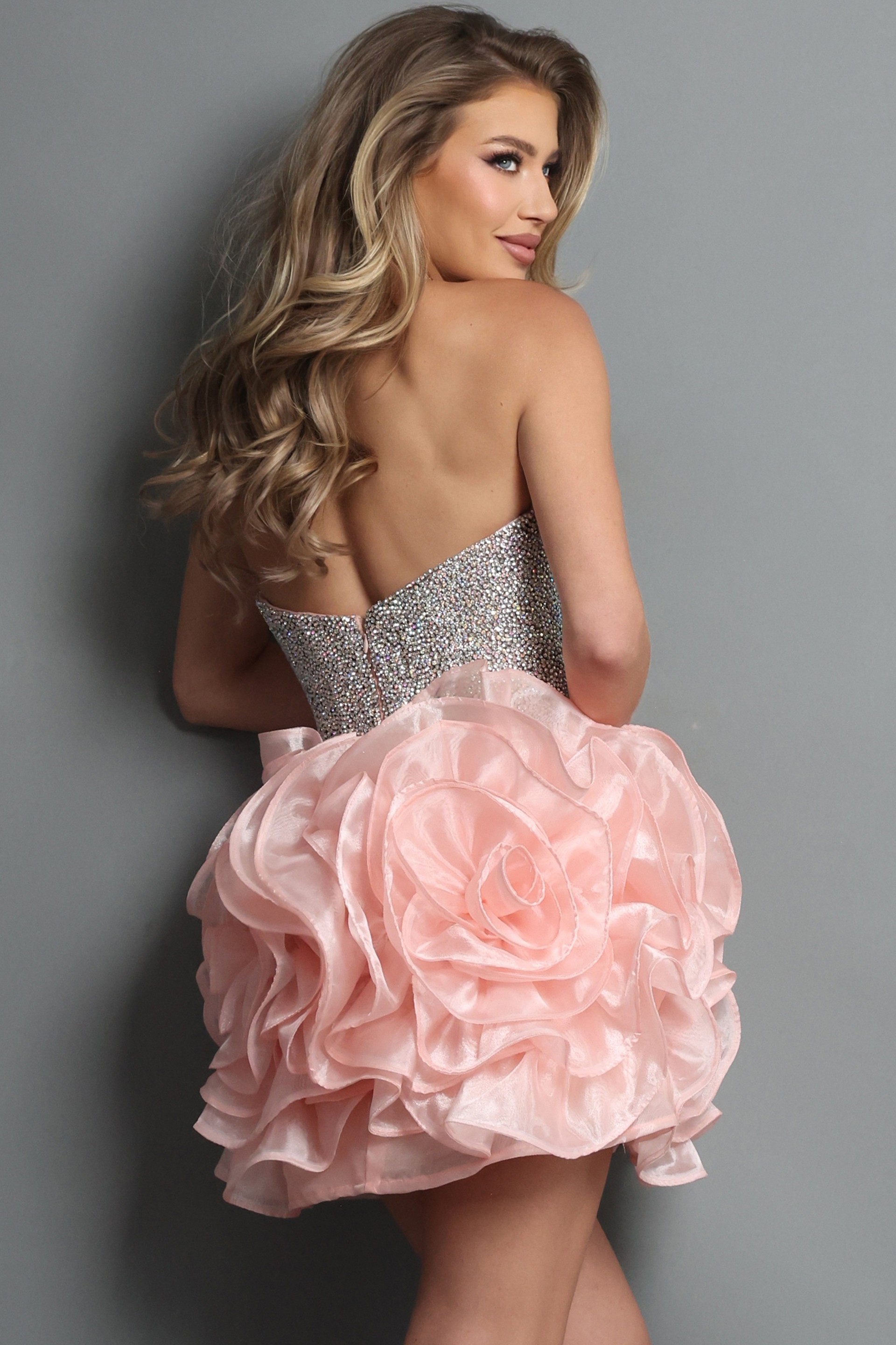 blush pink fit and flare mini dress with strapless sequin bodice rosette skirt