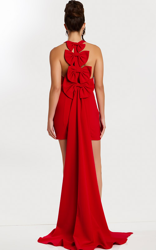Back view of red halter dress featuring three large bows and long train