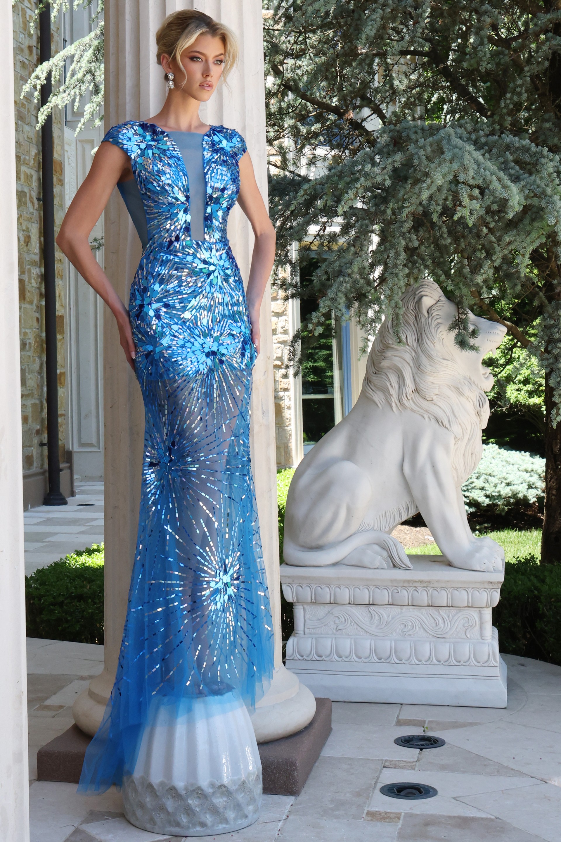 peacock sequin embellished gown - front full body, blonde updo, hands on hips