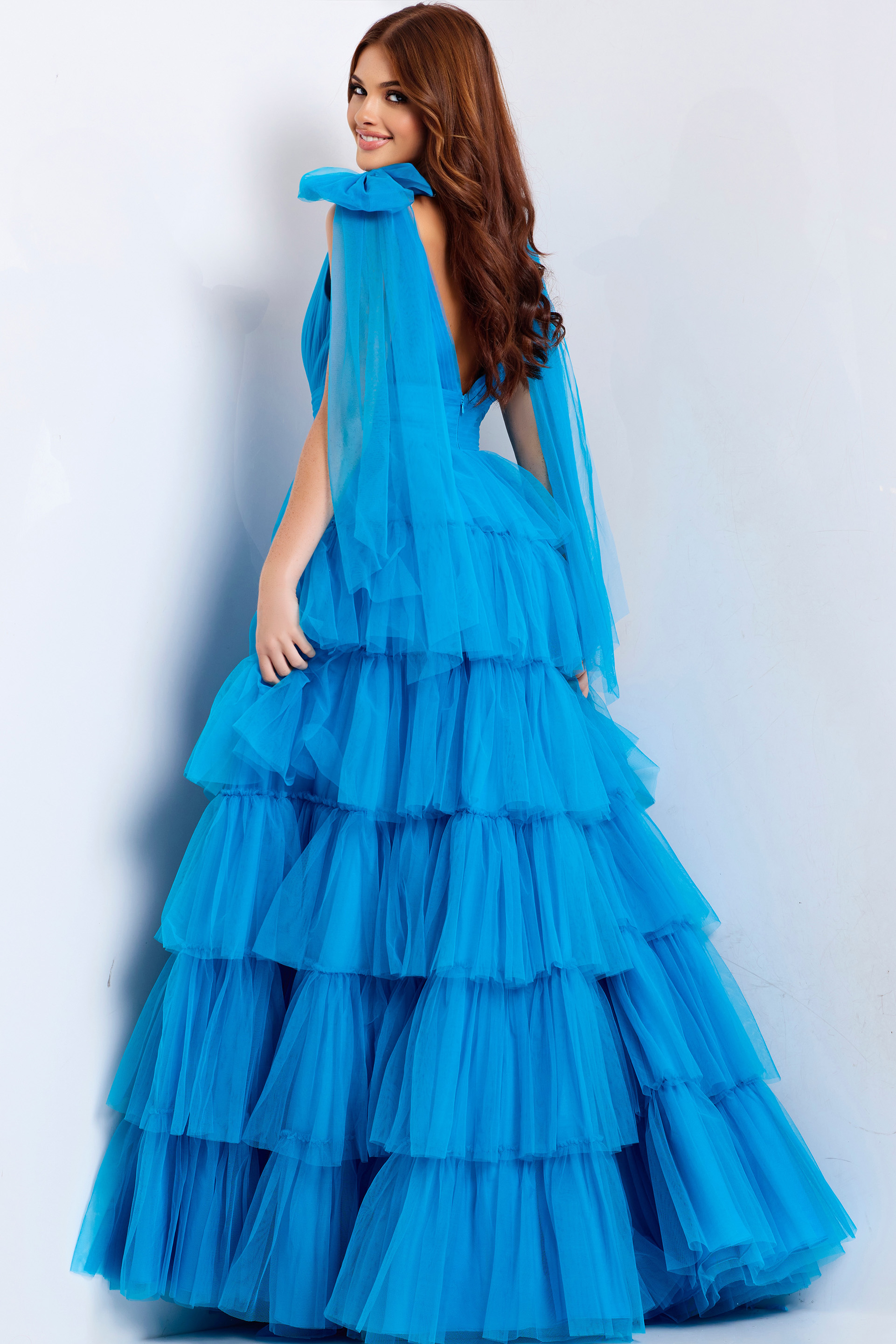 Light blue V-neck tiered gown with flowy tulle skirt