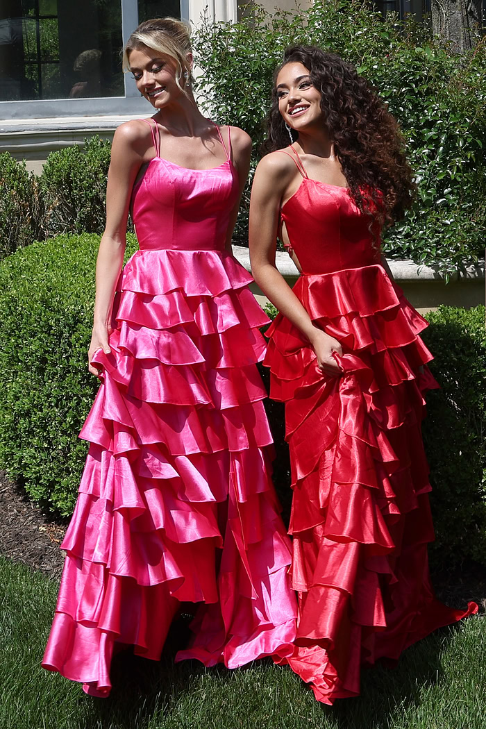 tiered satin dress with spaghetti straps - two girls front, blonde updo curly hair smiling