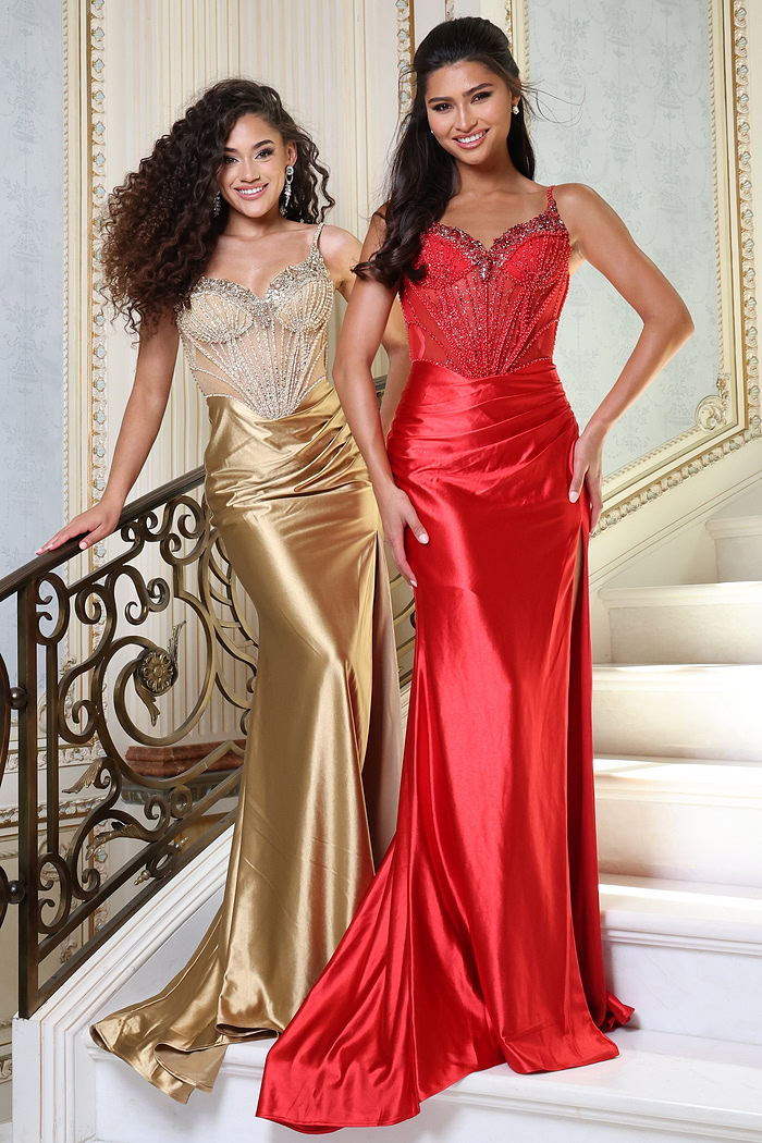 beaded corset satin prom dress with high slit - two girls front, curly hair railing staircase smiling