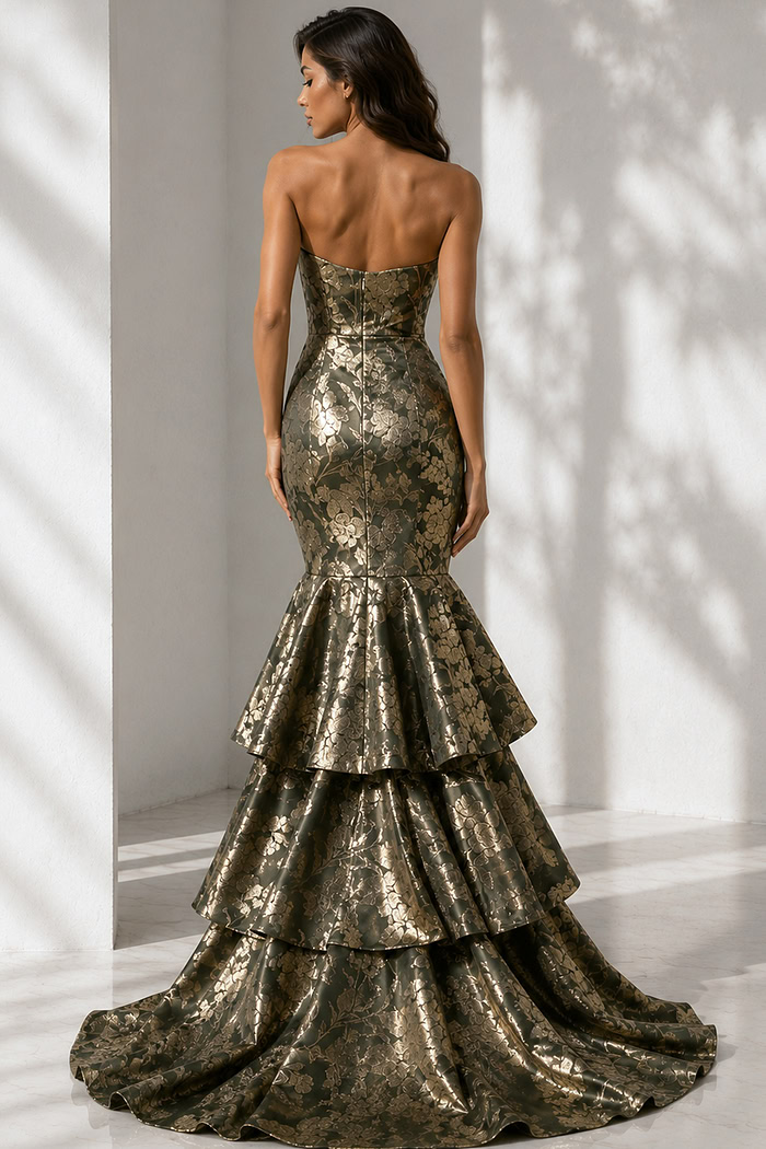 Dark olive and gold floral brocade mermaid gown with tiered ruffle skirt and elegant train, shown from the back.