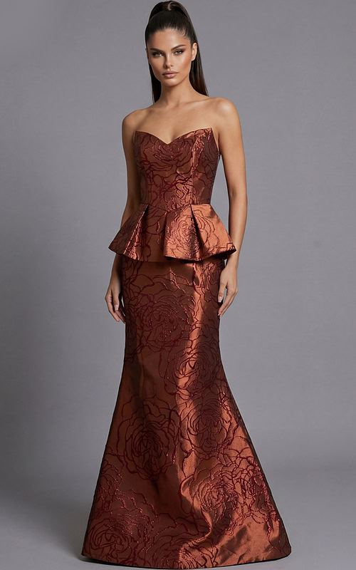 Strapless brocade evening gown with structured bodice and peplum waist