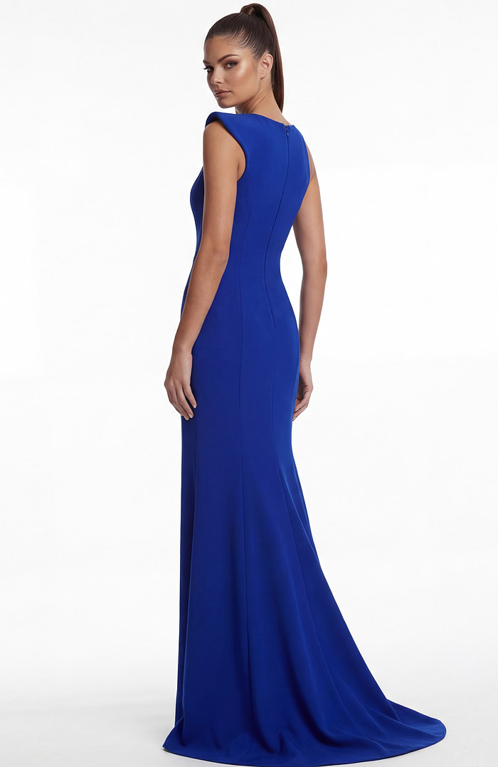 Back view of a fitted gown with clean lines and flowing floor length finish