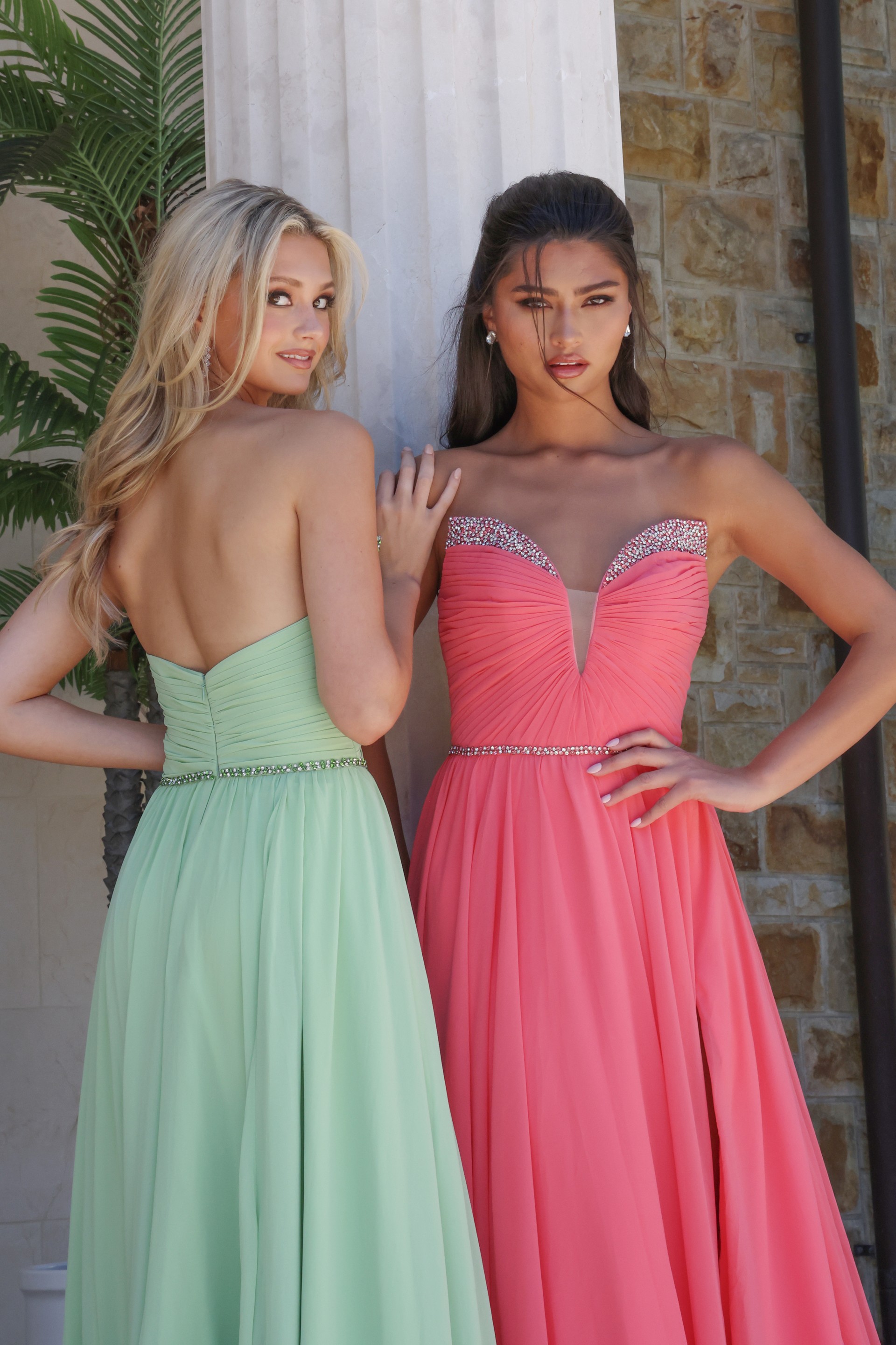 strapless coral chiffon a-line gown - two girls front, blonde back, dark hair hip