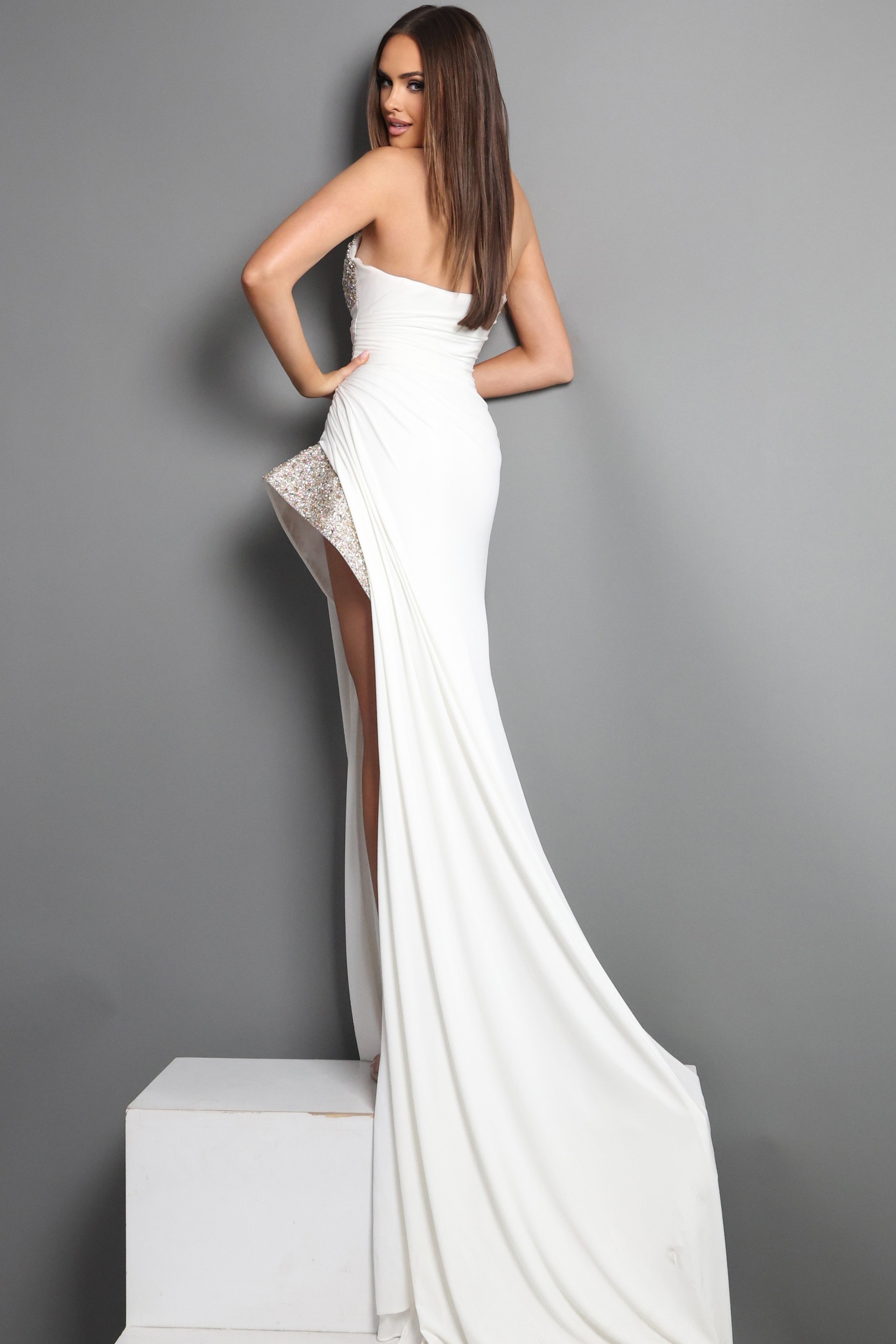 white sheath long dress with strapless sweetheart beaded bodice high slit