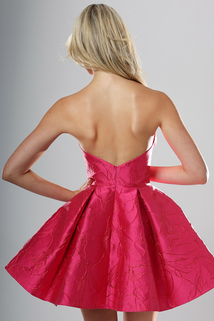 back view of raspberry brocade strapless A-line short homecoming dress with sweetheart bow neckline and pleated skirt, Jovani style 52120