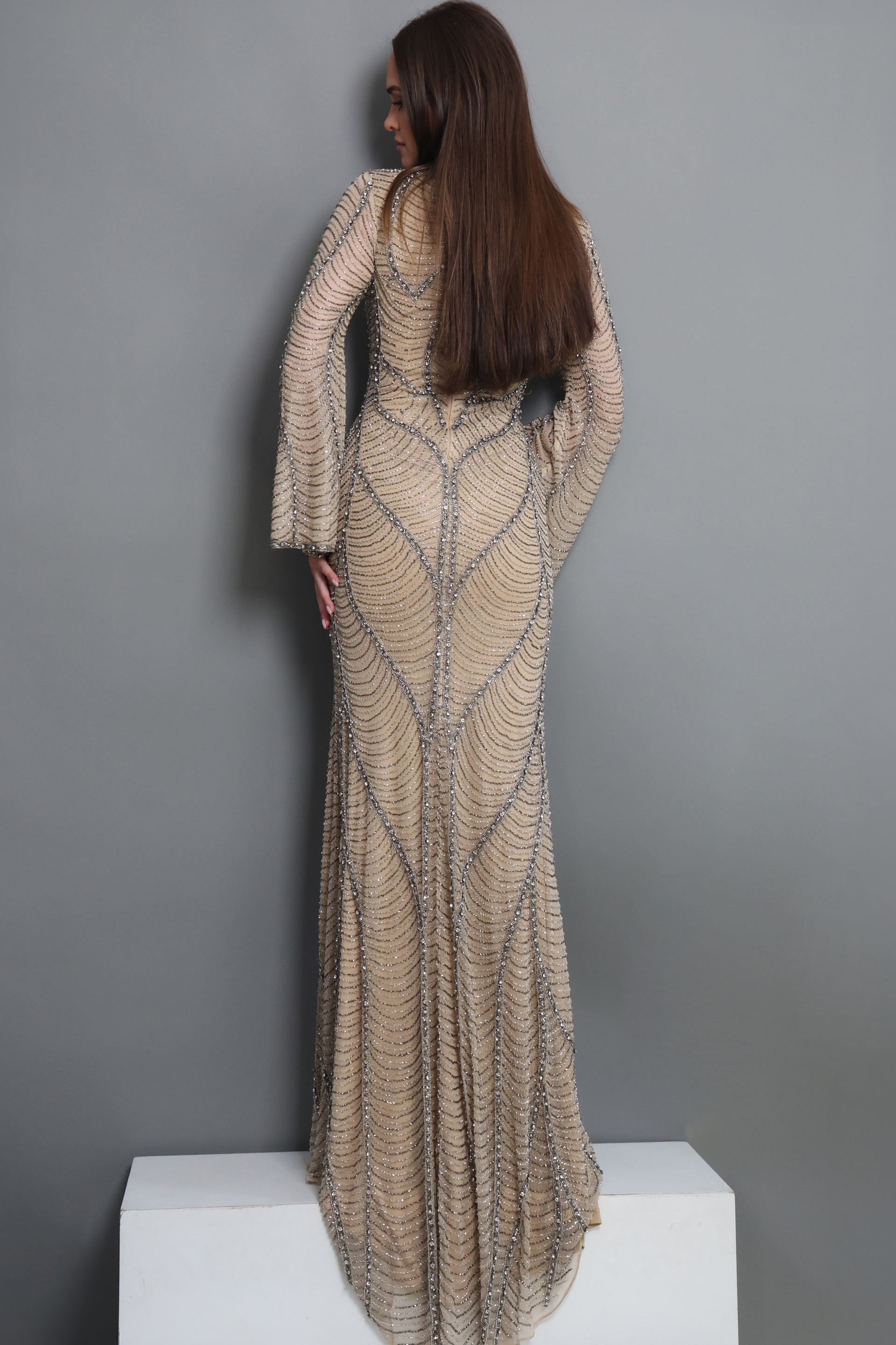 nude sheath long dress with high neck bell sleeve beaded pattern