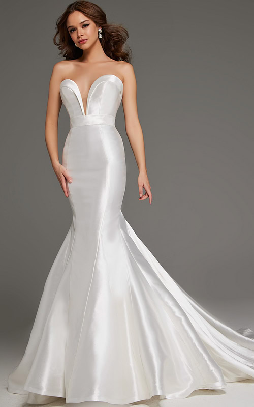 Model wearing JB05356 white mermaid dress, front view showing the strapless neckline and fitted silhouette.