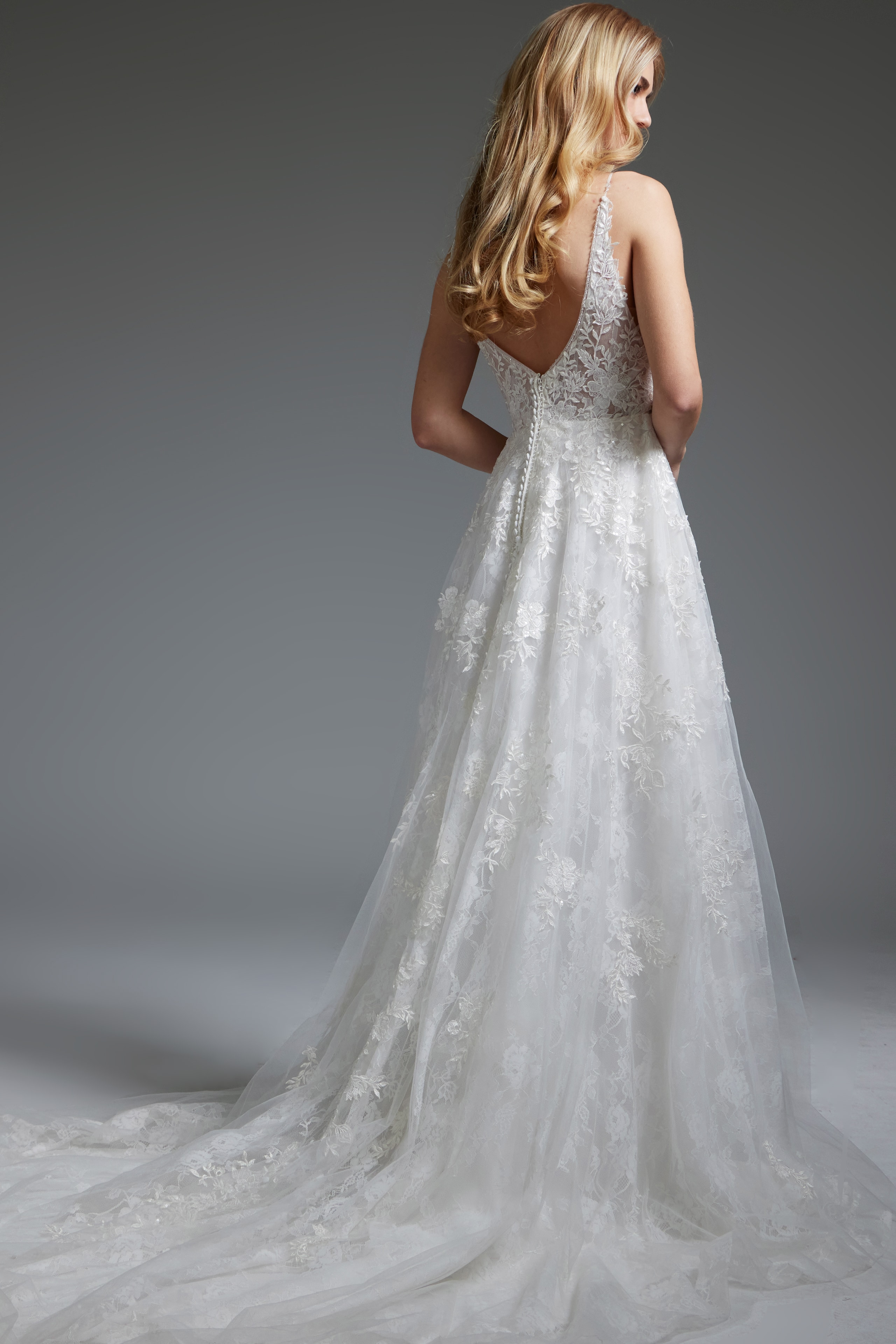 Back view of Jovani JB07147 ivory dress displaying low V back.