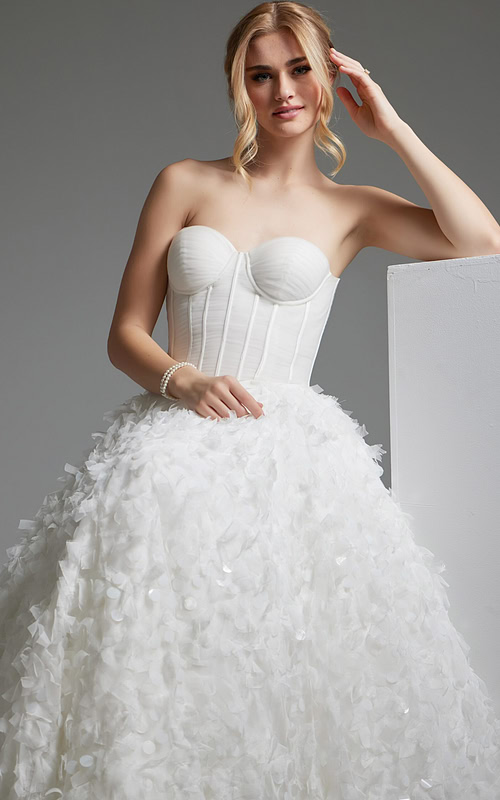closeup of model in Jovani JB26295 white gown with structured bodice