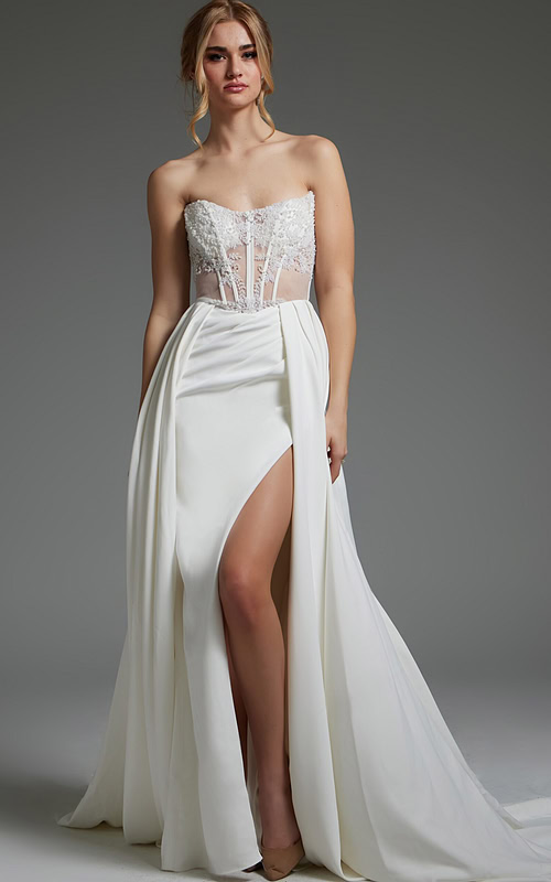 Model wearing Jovani JB37128 ivory dress with sweetheart neckline and high slit.
