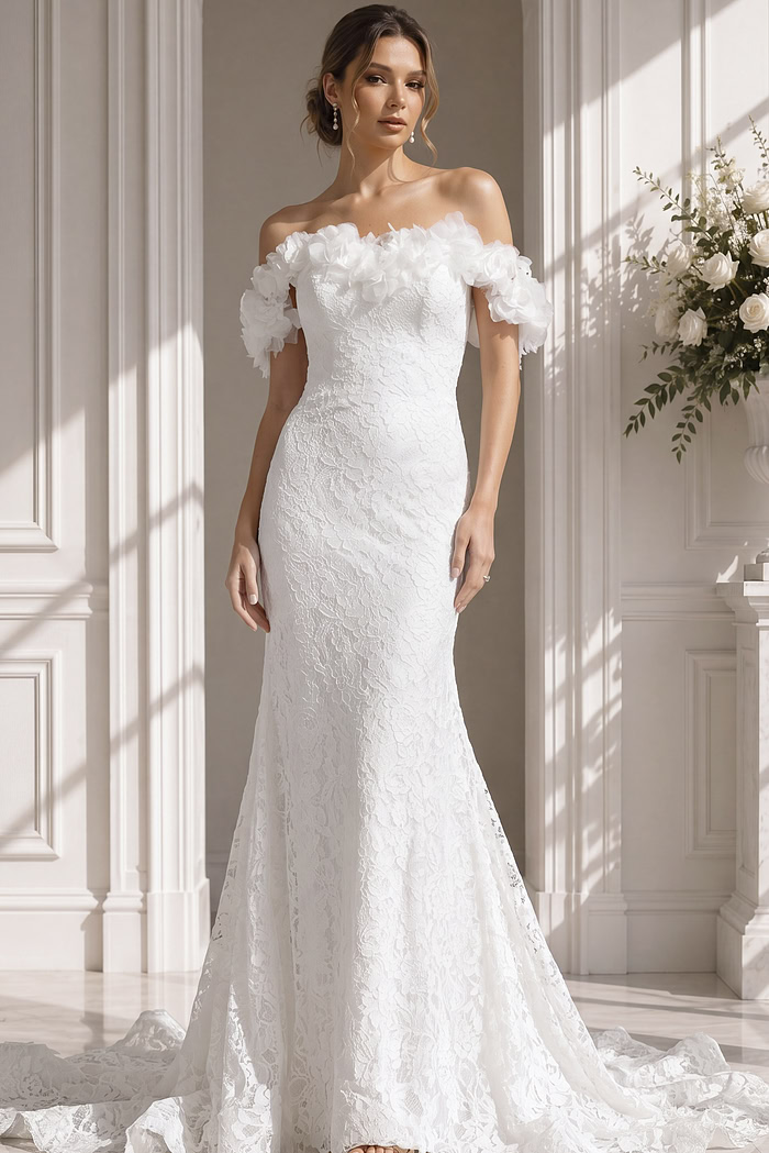 Sleeveless illusion lace fit-and-flare wedding gown with botanical embroidery and soft chapel train