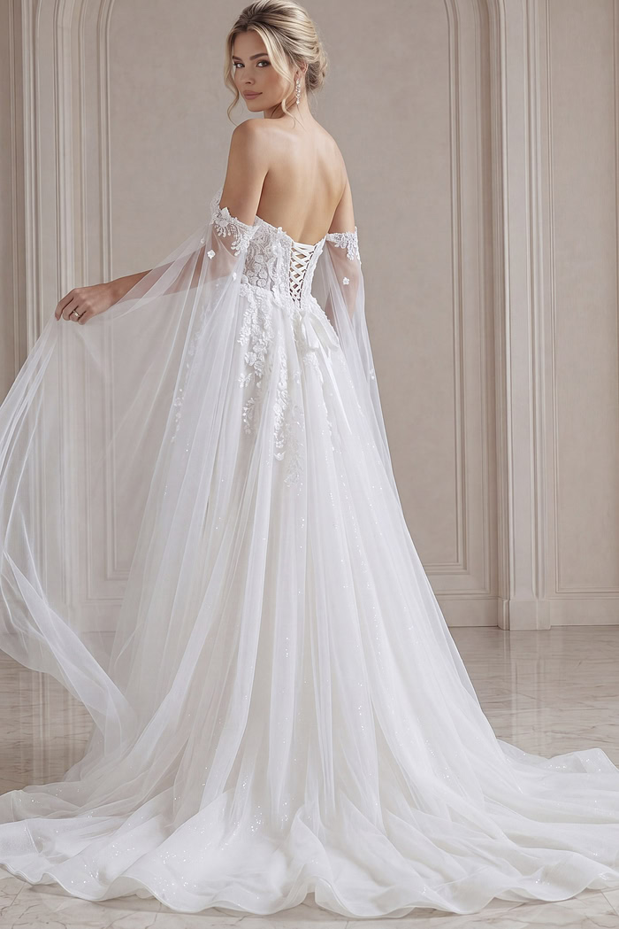 ivory floral lace A-line wedding dress with off the shoulder tulle cape sleeves, lace up corset back and sparkle tulle skirt, front view, Jovani Bridal style JB42481