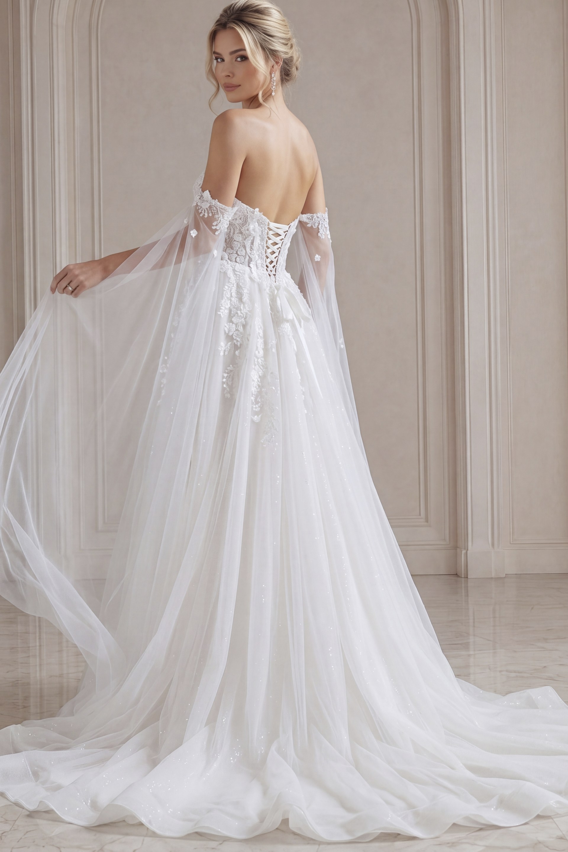 ivory floral lace A-line wedding dress with off the shoulder tulle cape sleeves, lace up corset back and sparkle tulle skirt, front view, Jovani Bridal style JB42481