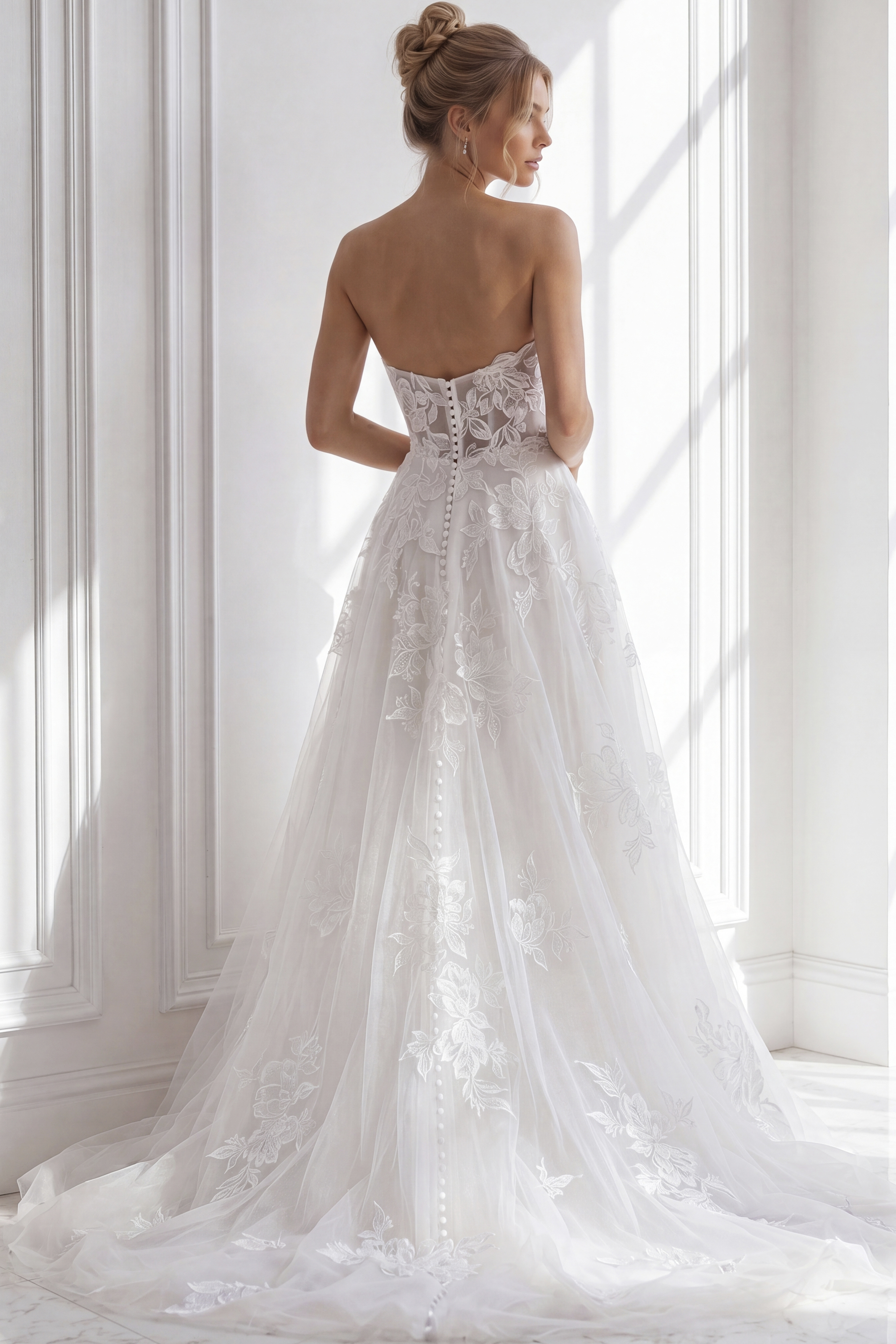 Strapless ivory wedding gown with a softly structured bodice