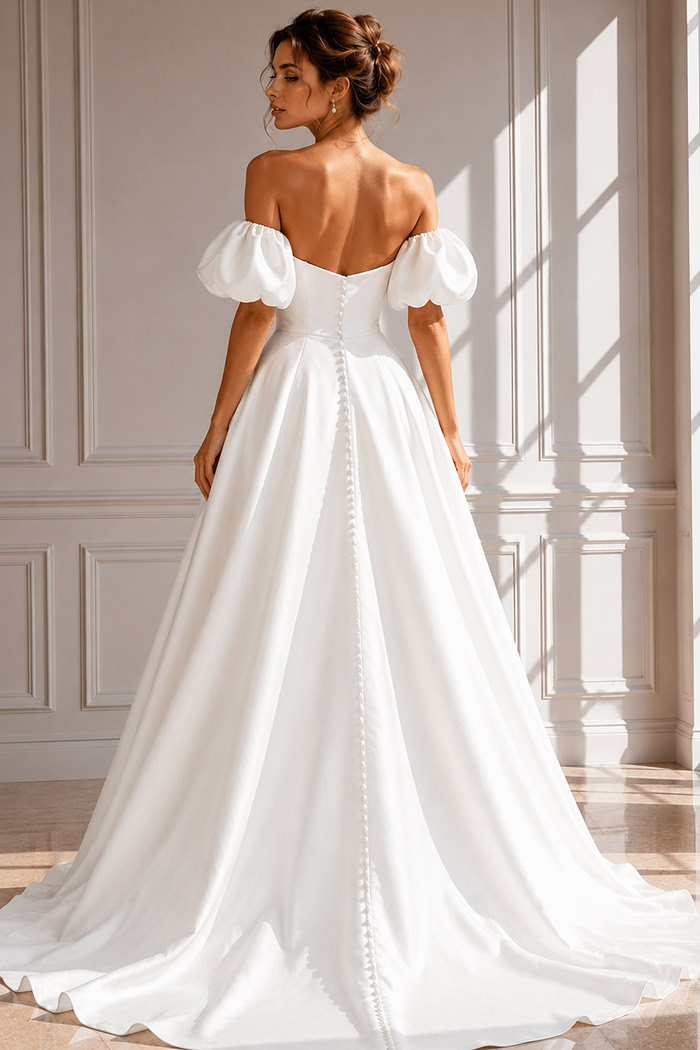 Elegant Princess Bridal Gown with Off-Shoulder Puff Sleeves and Flowing A-Line Silhouette