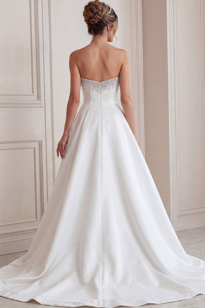 white satin strapless A-line wedding dress with beaded sweetheart neckline, peplum and high slit, front view, Jovani Bridal style JB45132