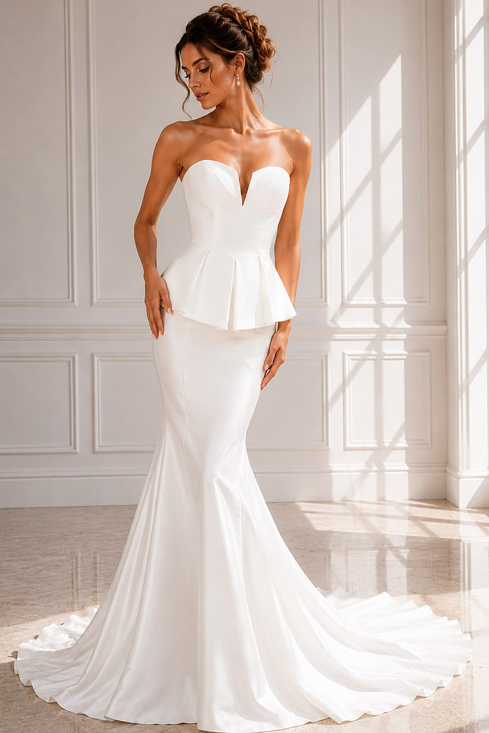 Modern satin bridal gown featuring a sweetheart neckline and sculpted silhouette.