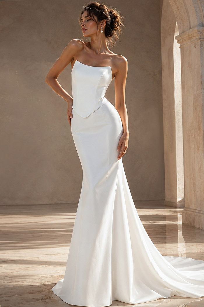 white satin strapless fitted mermaid wedding dress with asymmetric neckline and dropped corset waist, front view, Jovani Bridal style JB49077