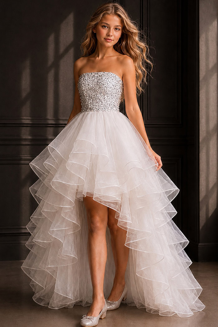 white strapless high low dress with embellished bodice and tiered organza ruffles
